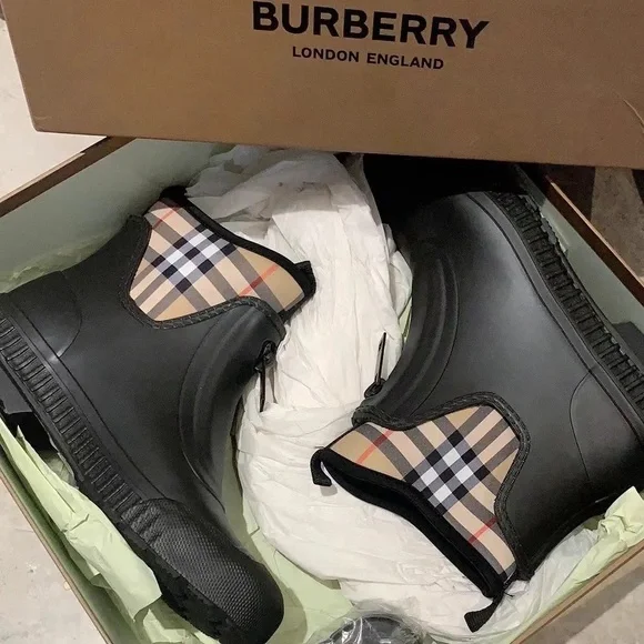 New in box Burberry rain boots with check lining
